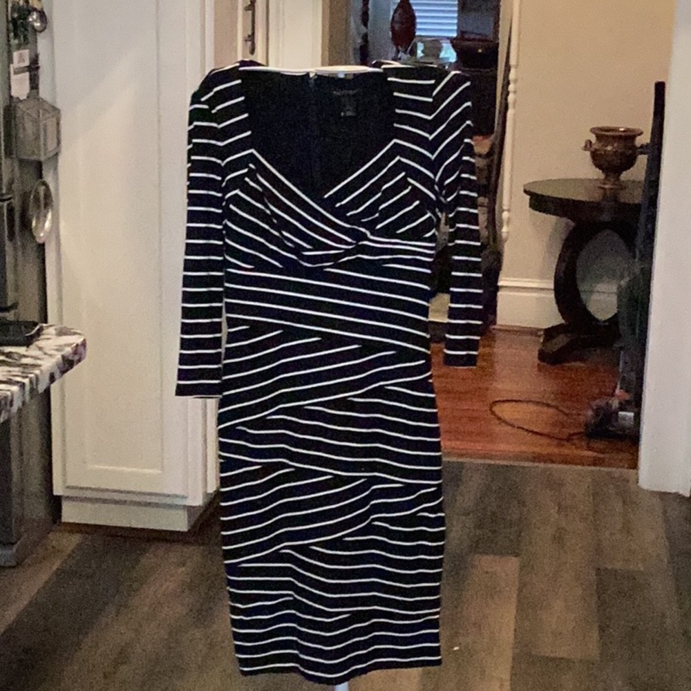 White House Black Market dress with built‎ in shaping slip. Worn a few times